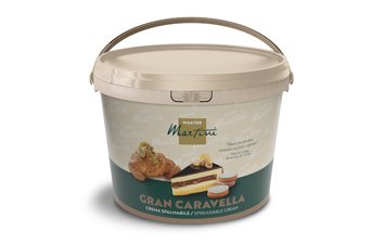 Beige Kunststoffeimer der Streichcreme Master Martini Gran Caravella mit Croissant- und Schichttorten-Motiv auf dem E...