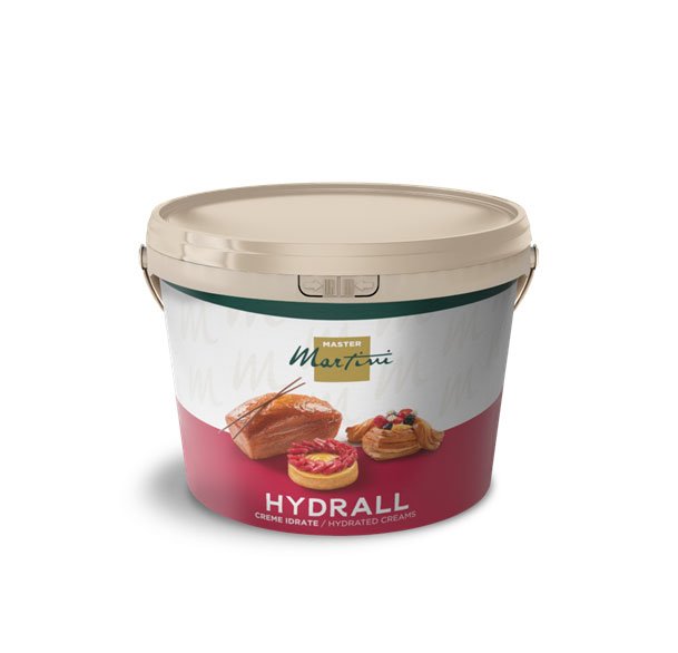 Beiger Eimer mit Hydrall-Feuchtcremes von Master Martini, mit Abbildungen von Gebäck und Obsttorten