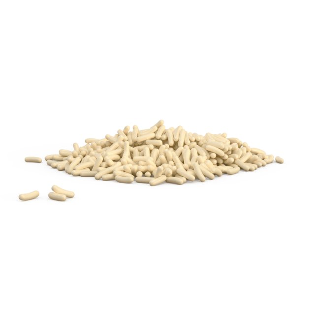 Kleiner Haufen cremefarbener zylindrischer Pellets auf weißem Hintergrund, mit einigen verstreuten Stücken daneben.